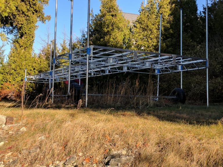 A dock on a grass field